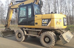 Caterpillar M 313 D, rok 2012